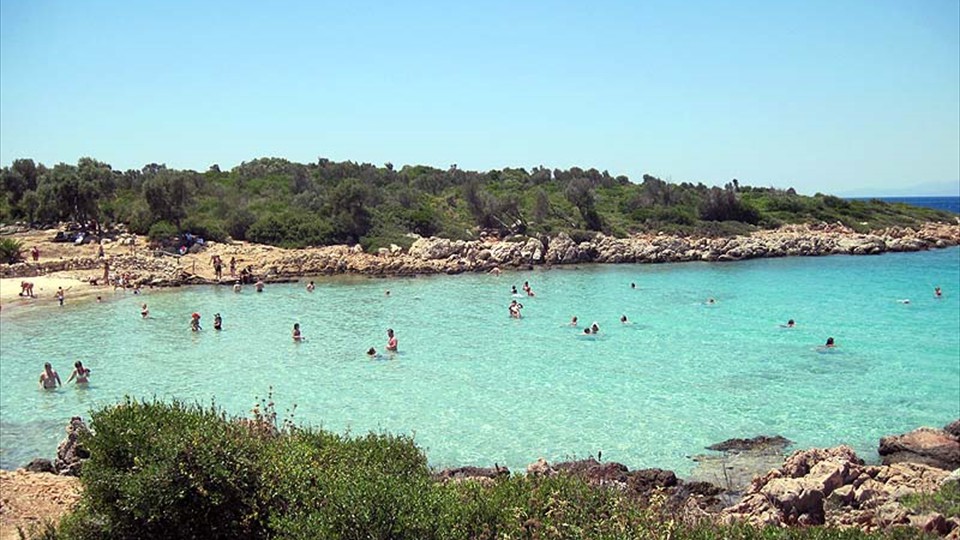 Unbelievably blue water for bathers at Cleopatra's Beach
