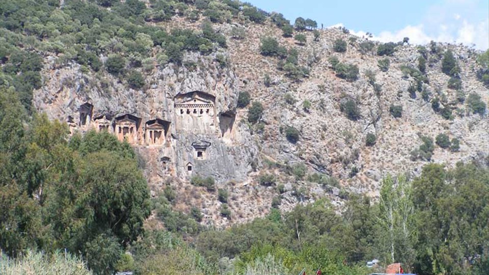 Dalyan - Lycian rock tombs gaze silently down