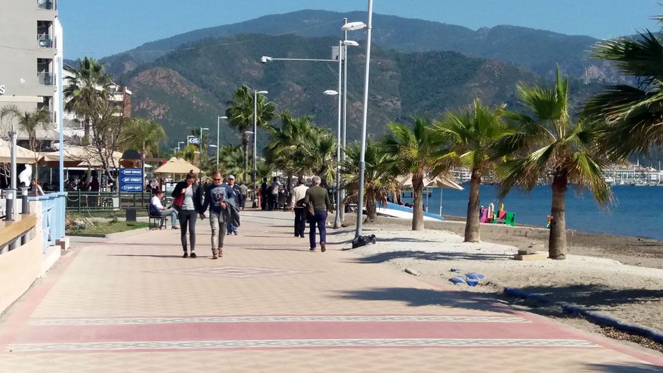 Glorious sunshine brings out the crowds on the promenade in Marmaris